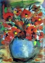 poppies in blue vase